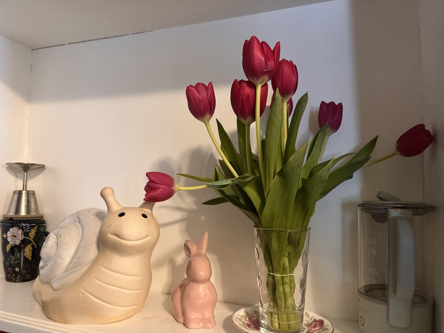 Flowers and teaware at the kitchen table